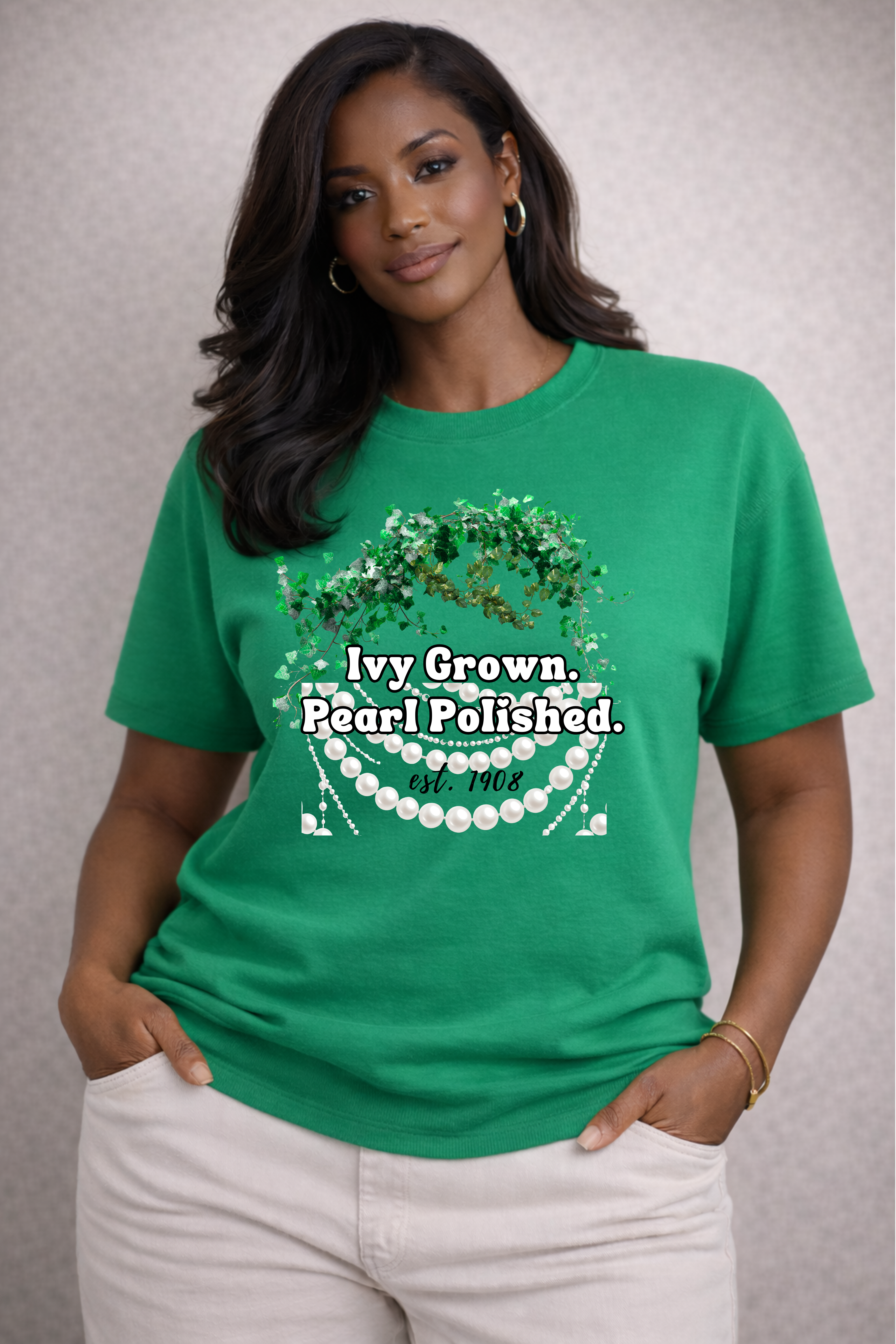 Woman wearing a green t-shirt with text and graphics on a plain background