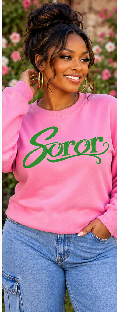 Pink sweatshirt with green Soror wordmark, square mockup